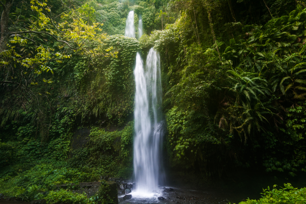 The twin cascades of the Sendang Gile waterfall are spectacular.