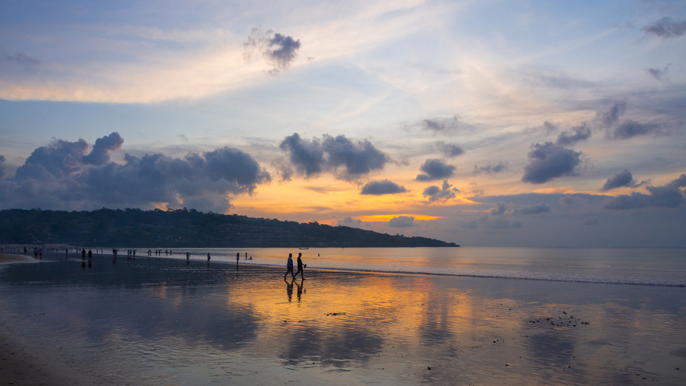 Stroll along the soft white sands of Jimbaran Beach.