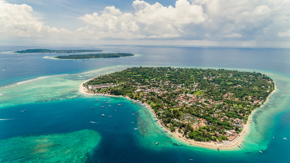 The Gili Islands are known for their beautiful reefs, crystal-clear waters and white sand beaches.