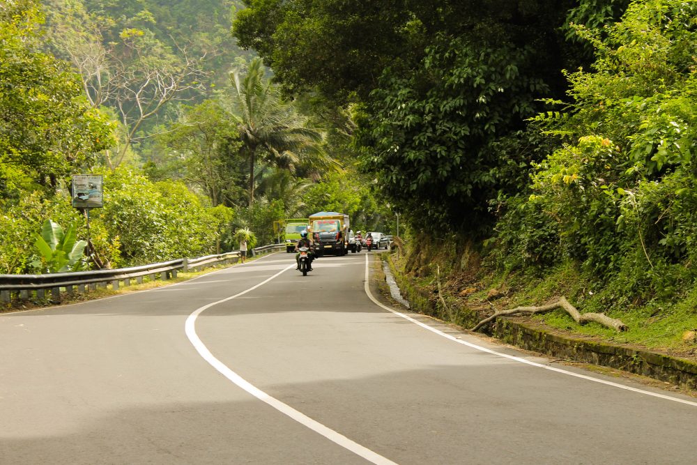 Pay close attention to the roads when driving in Bali. https://www.flickr.com/photos/166441674@N04/43287966565/in/photolist-28Xd9k8-KTkPMU-23oyXen-29YFEnb-27NQJhw-ULE1aC-C54Fc7-298au8C-2ayGNvQ-cCpZZU-26grRSm-LawVJz-27PtaK8-gVcWmb-24fXRTh-Uwu5CW-b8U3i4-GeCDVM-LTFikx-iqjqaG-MfJMQN-qodgAr-22giF1d-223Ztgr-298zgKy-HYy1Ks-CsF4nh-GPDCeV-Yu7jN7-2auMBw8-DJ1nLe-ZaWA5w-o3P4pb-SFbu8R-eCzj2p-25bG4NE-26BEvfo-Z6UnUh-YRn6GC-TFNnXg-7xcC8n-yuMpyS-218g7tY-XPevt4-EP9aKN-Zhf4wb-9UGyM7-26K7KRs-22wfoDQ-26cbunn