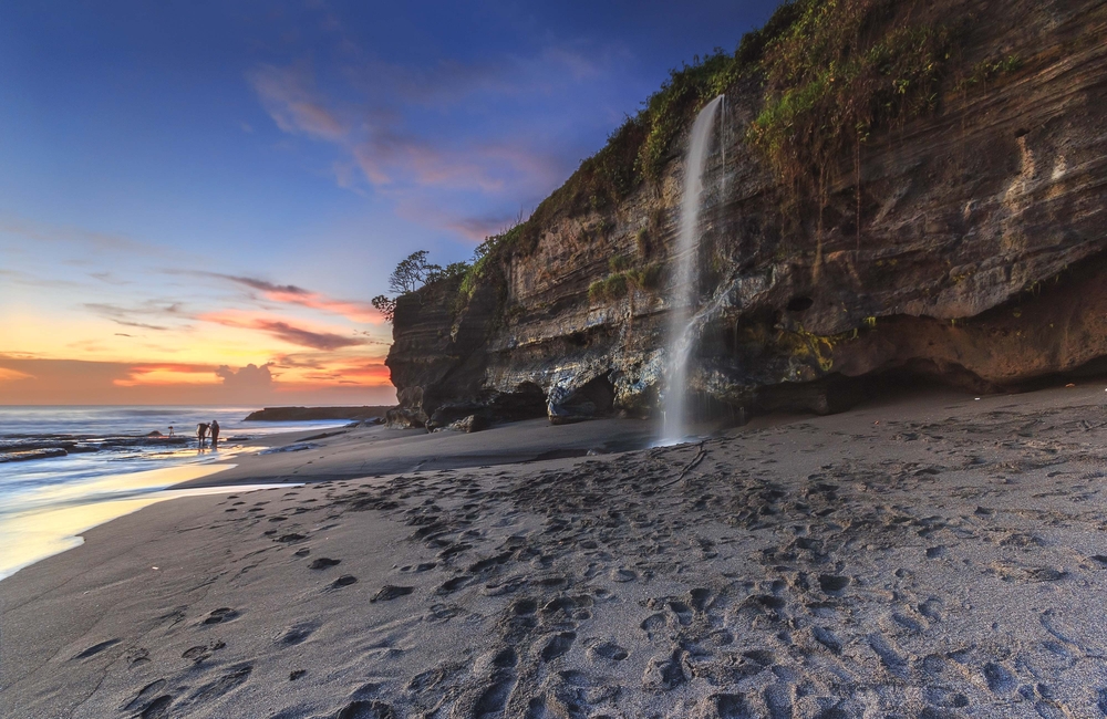 Melasti Beach sits at the foot of towering cliffs in Ungusan.